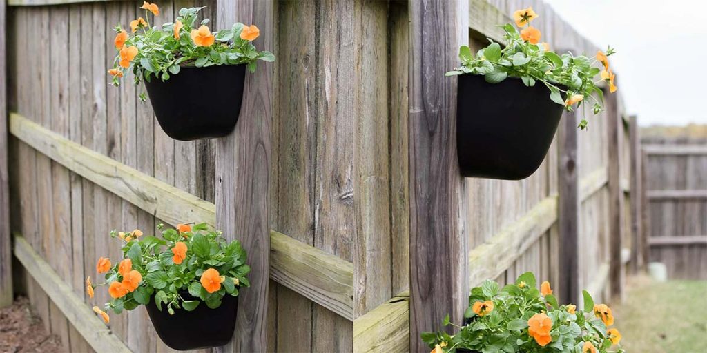 The Benefits of Adding Hanging Planters to Your Fence