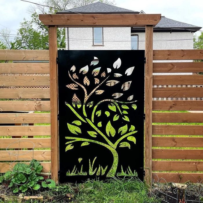 72. Enhancing Your Fence with Creative Gate Designs