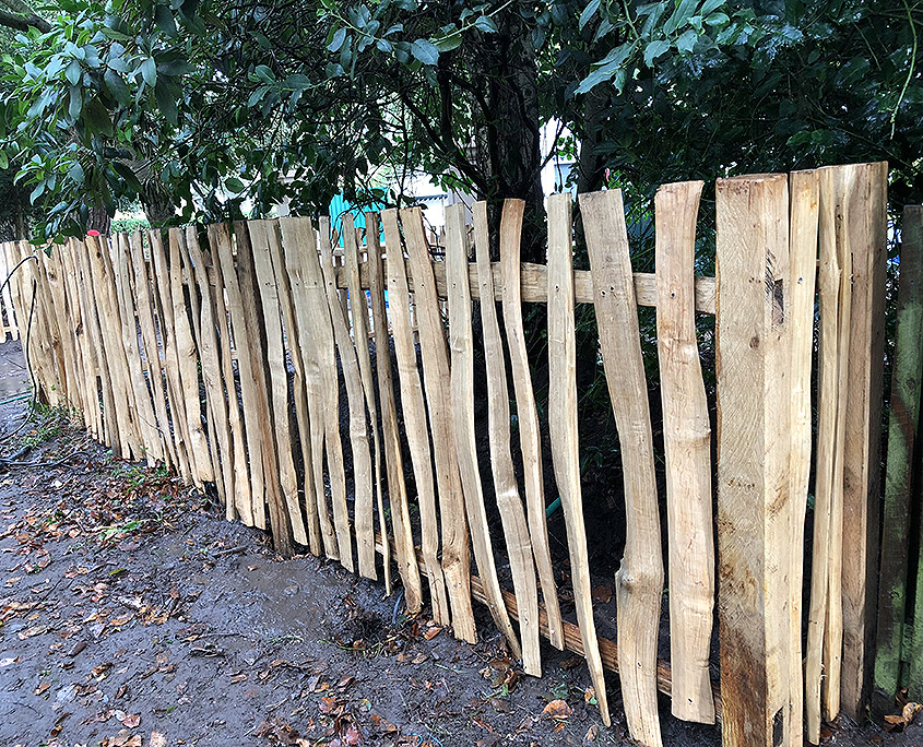 77. Achieving a Rustic Look with Weathered Fences