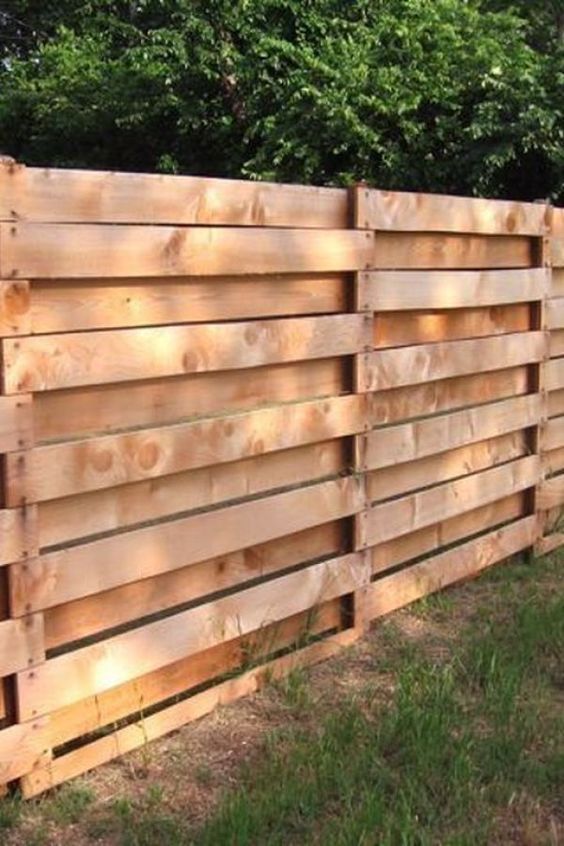 77. Achieving a Rustic Look with Weathered Fences